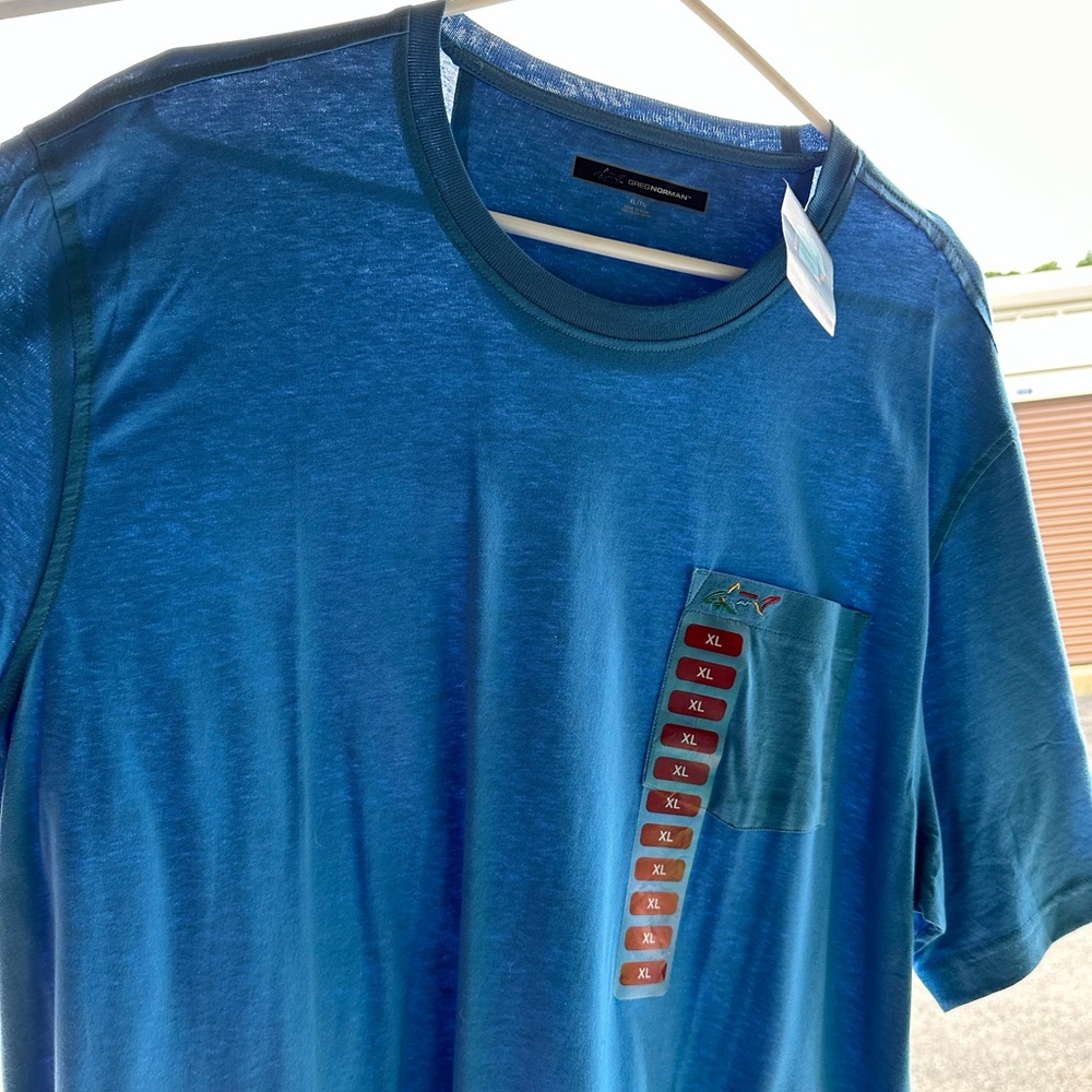 New un-used Greg Norman t-shirt size XL blue color